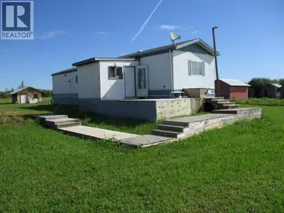 Here is a nice private acreage that comes with 10.25 acres, with a 1984 Ridge wood 14x72 mobile home...