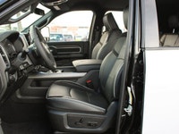 Renfrew Chrysler is proud to offer this Loaded Laramie with a custom Space Grey vinyl wrap, custom m... (image 2)