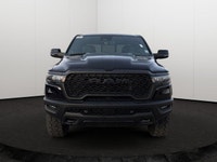 This 2026 RAM 1500 REBEL CREW CAB 4X4 has the following options Lux Leather Trimmed Bucket Seats, Re... (image 7)