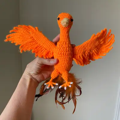 Crocheted baby phoenix, View more