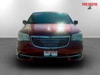 A spacious family minivan with comfortable seating, convenient features, and versatile cargo space,... (image 1)