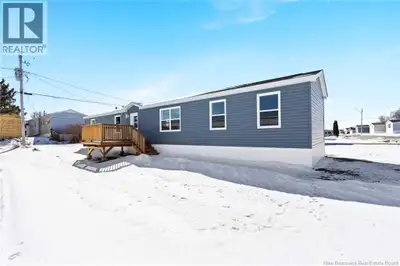 81 Evergreen offers modern comfort in a convenient location. The open-concept layout connects the ki...