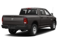 Presenting the rugged 2020 Ram 1500 Classic Express in a sophisticated gray with a potent 4x4 drivet... (image 1)