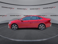 // ACCIDENT FREE!! // // SINGLE OWNER! // Finished in red with a black interior, this 2026 Volkswage... (image 4)