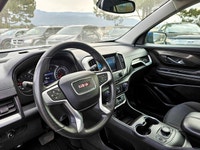 The 2022 GMC Terrain AWD SLE in a captivating Blue shade and equipped with an AWD drivetrain deliver... (image 8)