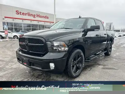 This striking 2023 Ram 1500 Classic SLT Crew Cab Pickup in Diamond Black Crystal Pearl with a Diesel...