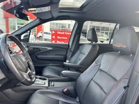 Conquer every adventure with the rugged yet refined 2023 Honda Passport TrailSport, a vehicle engine... (image 9)