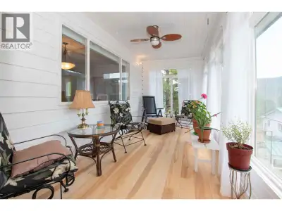 Loon Lake retreat living at its best. Set on a generous .64-acre lot, this beautifully kept and thou...