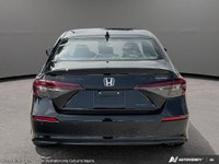 The 2026 Honda Civic Sedan Hybrid Sport Touring is a sophisticated blend of style and efficiency. It... (image 5)
