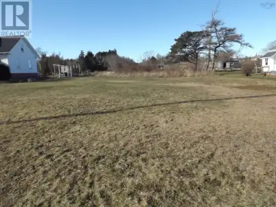 This 5.93 acre lot is long and rectangular with frontage on both Highway 335 West Pubnico and the Ar...