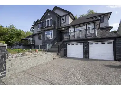 Beautiful, well built, well maintained, 3 level home with two basement suites on wide, private, 9473...