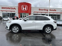 The pristine Platinum White Pearl exterior of this 2024 Honda HR-V LX-B instantly captivates. With j... (image 7)