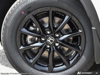 The 2026 Honda CR-V Hybrid EX-L AWD, dressed in a sophisticated white exterior and outfitted with a... (image 7)