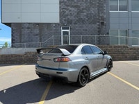 This 2014 Mitsubishi Lancer Evolution delivers pure performance with its turbocharged 2.0L engine, a... (image 5)