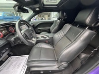 The 2023 Dodge Challenger SRT Hellcat Jailbreak in a stunning purple hue captivates with its rear-wh... (image 8)