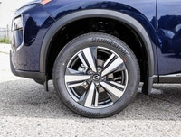 The 2025 Nissan Rogue SV Moonroof in a stunning blue finish equipped with AWD is perfect for those s... (image 8)