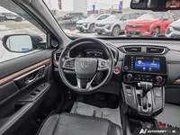 This 2019 Honda CR-V Touring is powered by a 1.5L turbocharged I4 engine paired with a continuously... (image 9)