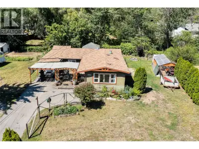 Charming rancher with loads of character, and plenty of indoor and outdoor living spaces. This sweet...