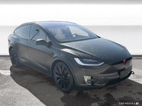 The 2017 Tesla Model X includes a power liftgate, heated front seats, and a navigation system. It of... (image 6)