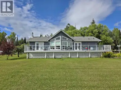 Bring your boat, toys & horses to this rare acreage just a stone's throw from Ten Mile Lake! This im...