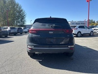 Navigate city streets and conquer daily commutes with ease in the 2020 Kia Sportage EX. This sporty... (image 5)