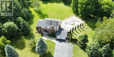 Experience the perfect blend of peaceful country living and modern convenience on 4.08 private acres...