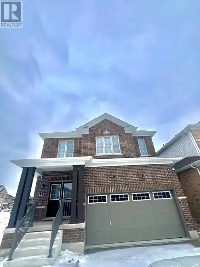 Newer detached house with dark flooring located is a safe family oriented community. Close to parks...