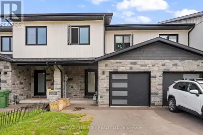Welcome to this beautiful 2022-built townhome, ideally located within walking distance of the Emeral...