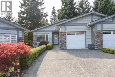 Tucked away in a quiet East Courtenay location, this spacious 3-bed + den, 3-bath townhome offers 2,...