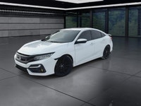 The 2020 Honda Civic Si Sedan in white offers a dynamic driving experience with its FWD drivetrain a... (image 3)