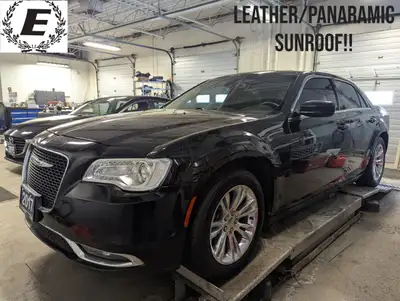 Cruise the streets in style with this sleek, black 2017 Chrysler 300 Touring, now available at Ecker...