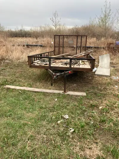 single axle with fold down tailgate ramp and side load ramp for quads etc. Bought new in 2020 , wood...
