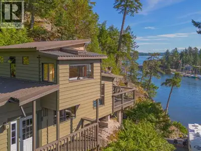 A truly rare offering on the Upper Sunshine Coast, a waterfront home with private moorage. Located i...