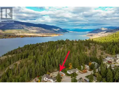 Enjoy lakeside living without strata fees in this immaculate 4-bedroom, 3-bath rancher-style home. T...