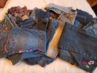 22 pairs of young girls jeans. Size 6. Excellent condition.