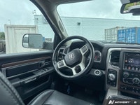 Command your day with this robust 2017 Ram 1500 Laramie Crew Cab Pickup. Powering through tasks or c... (image 8)