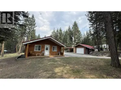 Welcome to this charming log home tucked away on a quiet dead end street in the highly sought after...