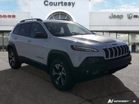 Discover seamless navigation and breathtaking open-air experiences in this Bright White 2017 Jeep Ch... (image 7)