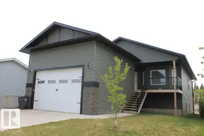 Looking for a great investment or a place with some extra income potential? This legally suited home...
