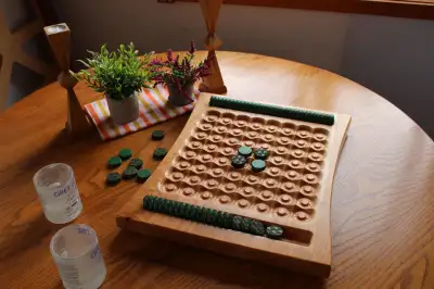 This Wooden Othello Game Board was carved from a block of North American Cherry by Wood Artist Paul...