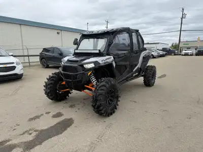 The 2018 Polaris RZR XP 4 Turbo is built for thrill-seekers who want to bring the whole crew along f...