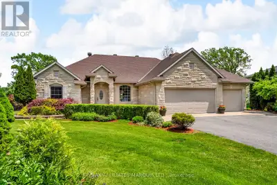 Welcome to this exceptional executive bungalow, perfectly positioned on a spacious lot backing onto...