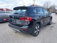 The 2024 Volkswagen Taos Comfortline is a compact SUV that offers a great balance of efficiency, pra... (image 6)