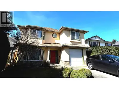 A custom built cozy home sits on a 40*100 lot back to McMath Secondary School and walking distance t...