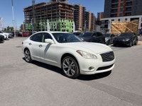 L’Infiniti M37x 2013 est une berline de luxe à traction intégrale (AWD) qui allie performance, confo... (image 1)