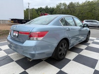 A reliable midsize sedan with a comfortable interior, smooth performance, and practical convenience... (image 3)