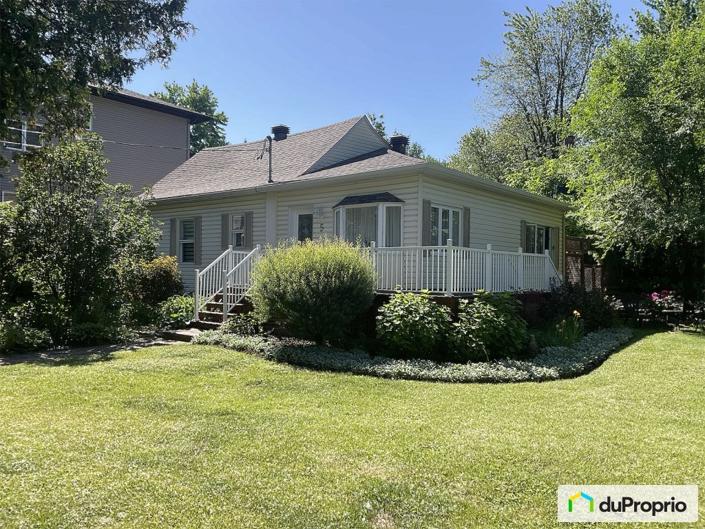 $485,000 - Bungalow for sale in Ste-Rose — photo 1