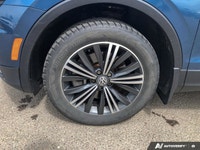 This Volkswagen Tiguan boasts a Intercooled Turbo Regular Unleaded I-4 2.0 L/121 engine powering thi... (image 9)