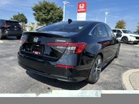 Experience the sleek sophistication of this 2024 Honda Civic Sedan Touring, boasting a captivating C... (image 4)