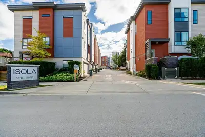 First time on the market! Rare SE-facing duplex-style townhouse offering over 1,600 sq. ft. with 4 b...